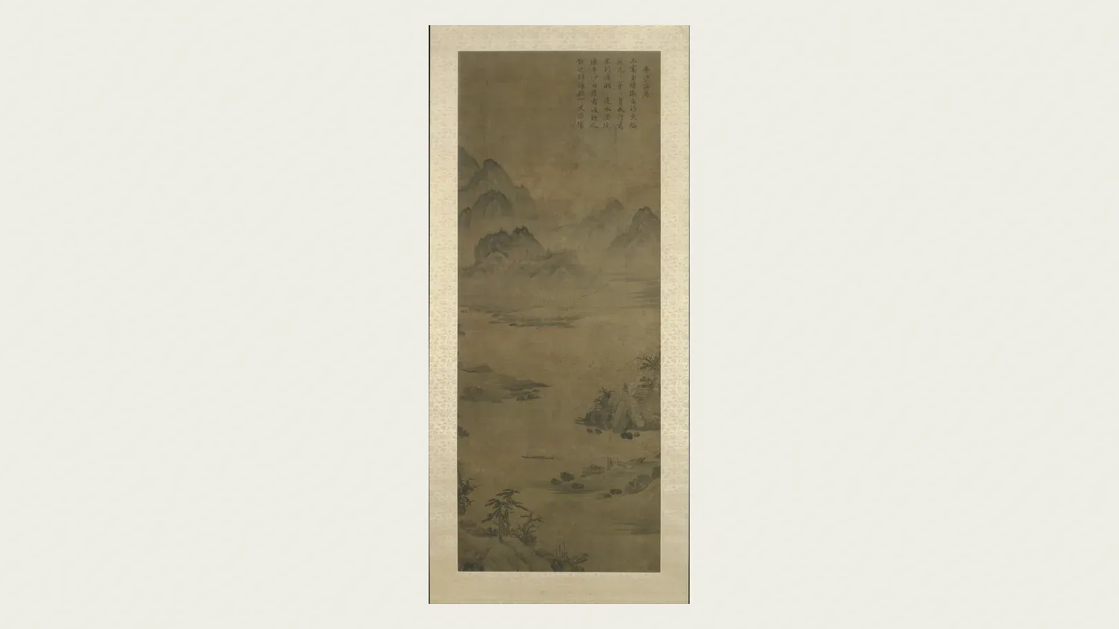 A single flowering stem brushed in ink on a hanging scroll