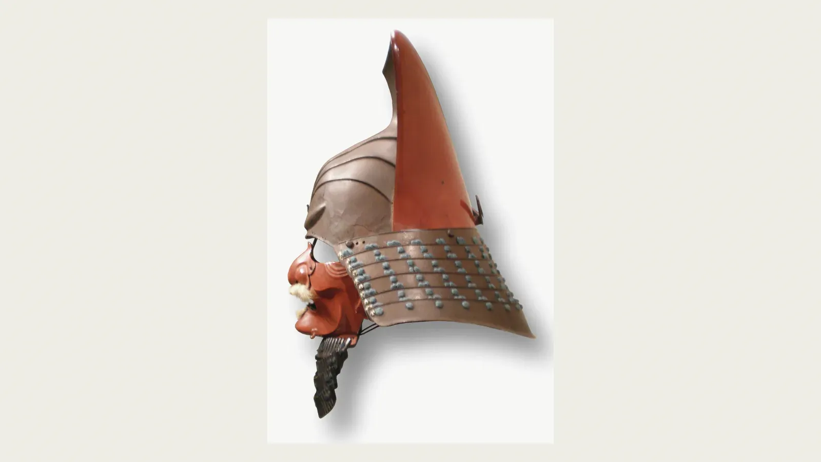 A red-laced samurai helmet, the bowl and neck-guard only