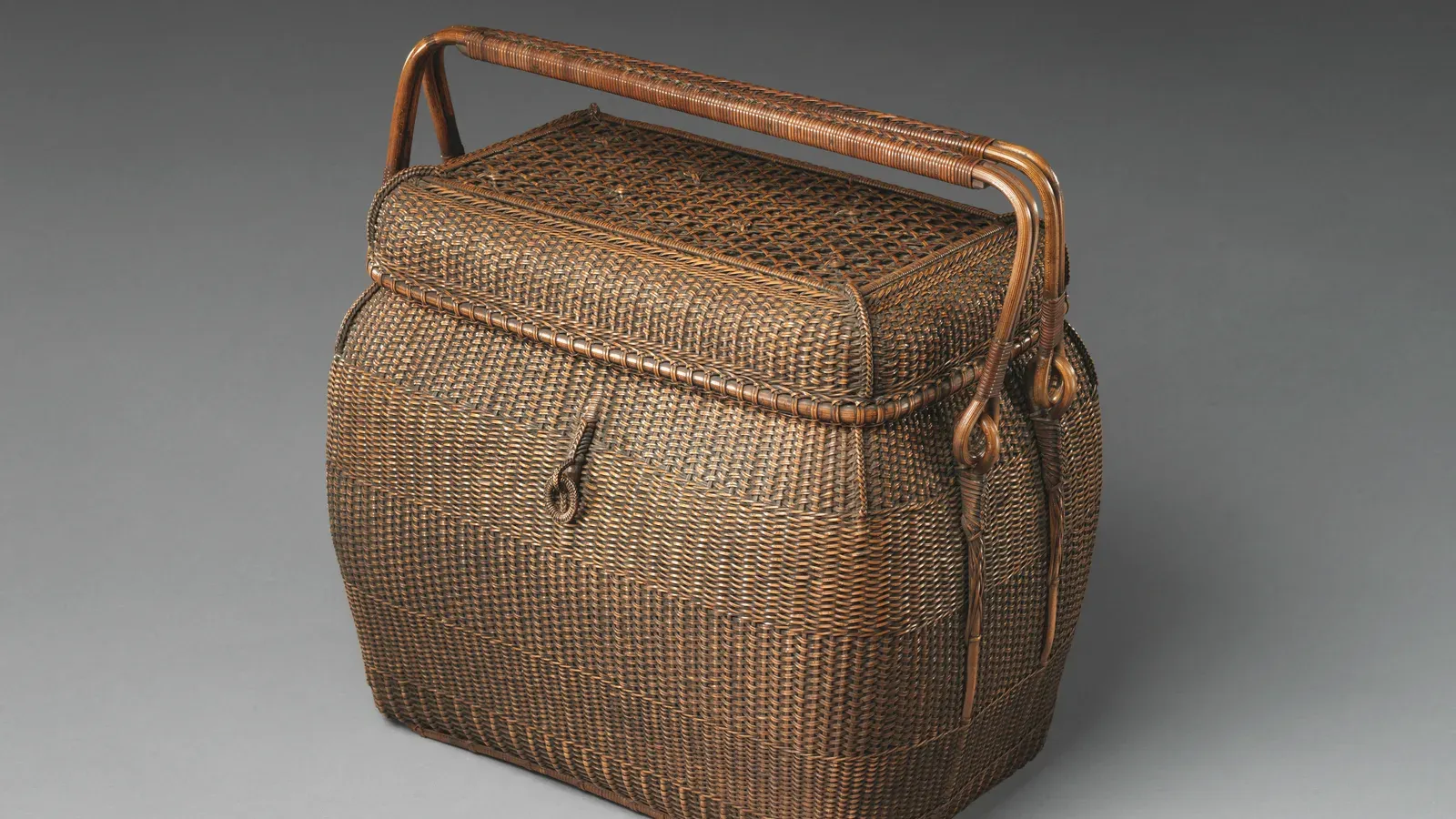 A finely woven travel basket for tea utensils